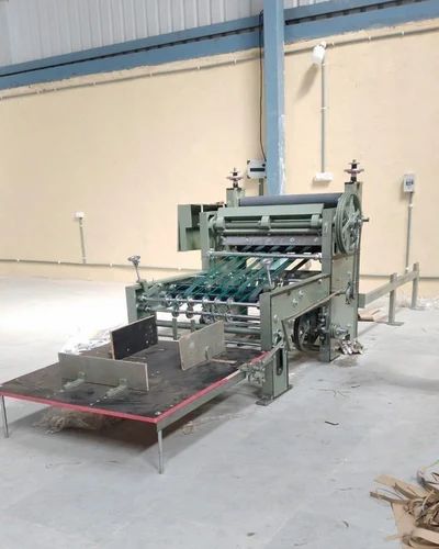 Automatic paper roll to sheet cutting machine for non woven